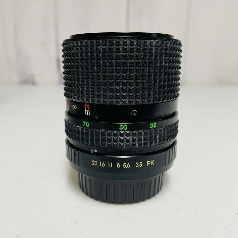 RKN MC AUTO ZOOM 1:3.5-4.5 f=35-70MM CAMERA LENS